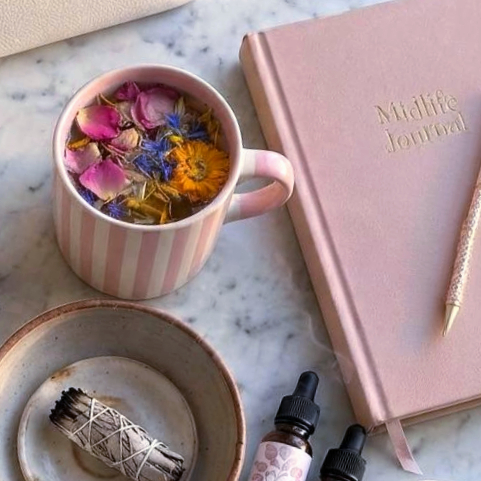 Edible Flower & Herbal Tea Burning Sage For An Afternoon Wellness Routine.