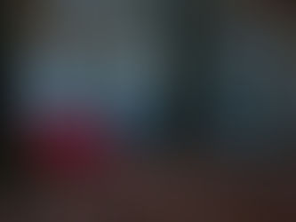 Ett campingläger med tält, hängmatta och tarpar