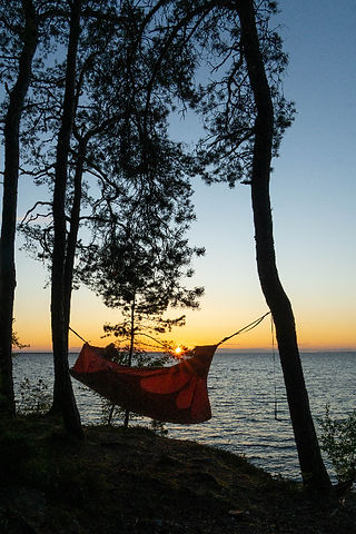 Hängmatta i solnedgång