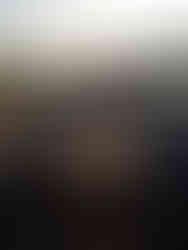 Pannkaka på stekhäll över eld