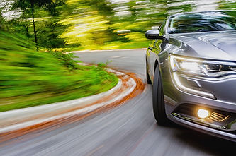 CarDrivingInCurve.jpg