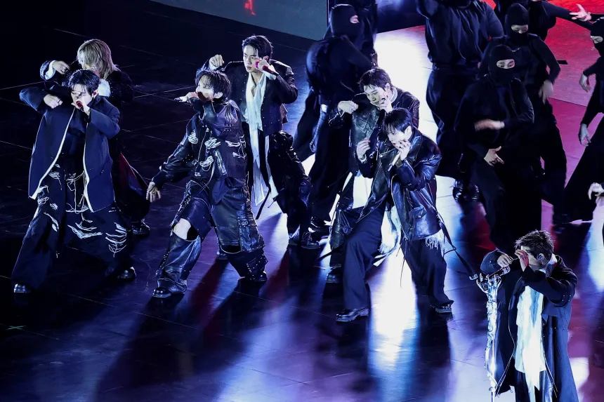 BTS wore flowy, monochromatic clothes during the "BTS The Comeback Live Arirang" concert in central Seoul on March 21, 2026.Kim Hong-Ji/Pool/Reuters)
