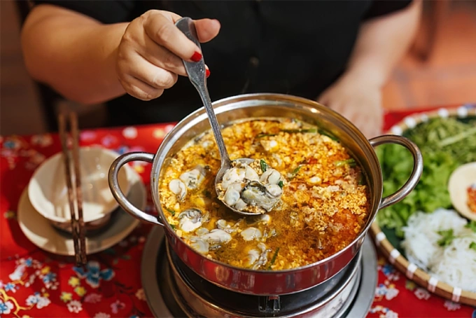 Hot pot is often presented on an alcohol stove. Photo courtesy of Michelin Guide