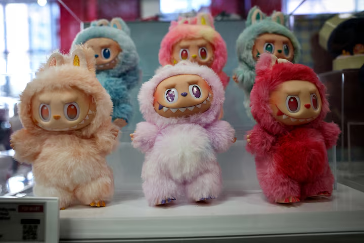 oys are displayed at at Pop Mart's Skullpanda pop-up shop in Manhattan, in New York City, U.S., December 12, 2025. REUTERS/Mike Segar/File Photo Purchase Licensing Rights