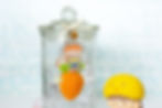 close up view of the acrylic charm depicting a cute scarecrow girl