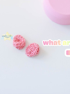 small crochet shoes with text reading what are those