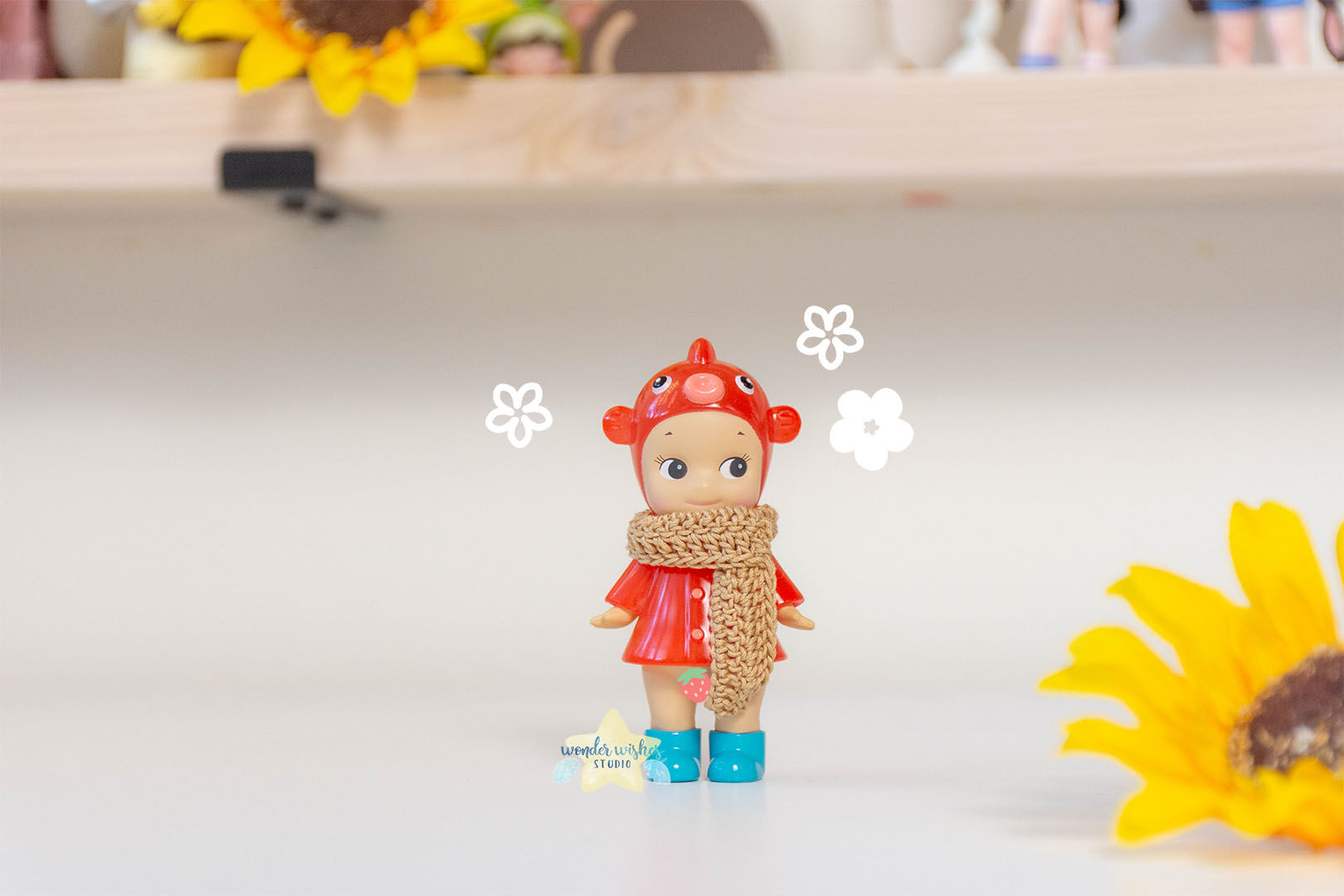 a sonny angel modelling the crochet scarf front view