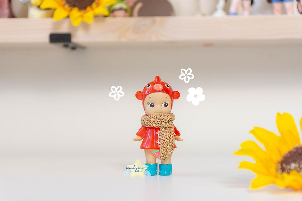 a sonny angel modelling the crochet scarf front view