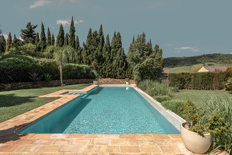 Casa La Siesta outdoor pool cypress trees landscape photography Andalucia Spain Alanoud Radaideh