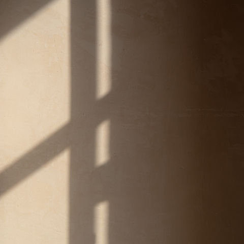Casa La Siesta warm shadow plaster wall interior architecture photography Andalucia Spain Alanoud Radaideh