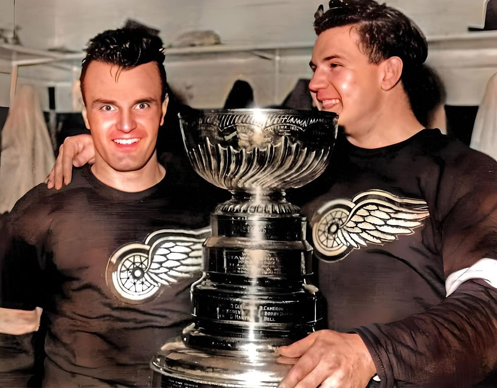 Red Wings hero Pete Babando (left) holding the Stanley Cup