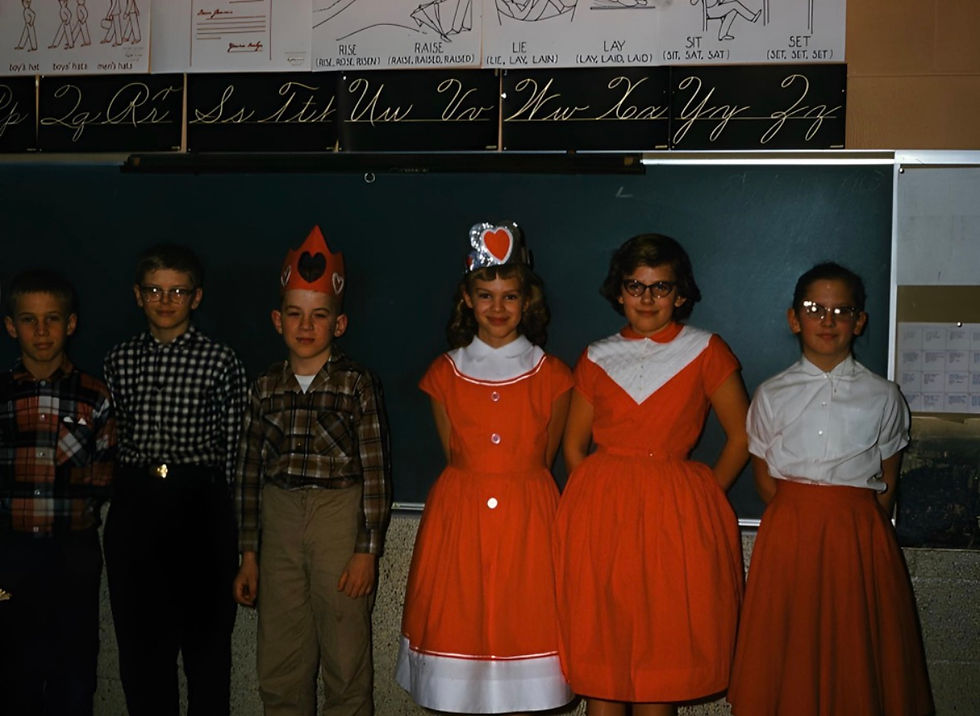 Don McLennan, John Single, Chris Newhouse, Judy Moeller, Linda Crow, and Nancy VanZandt celebrating Valentine’s Day at Rogers City Elementary School, 1959