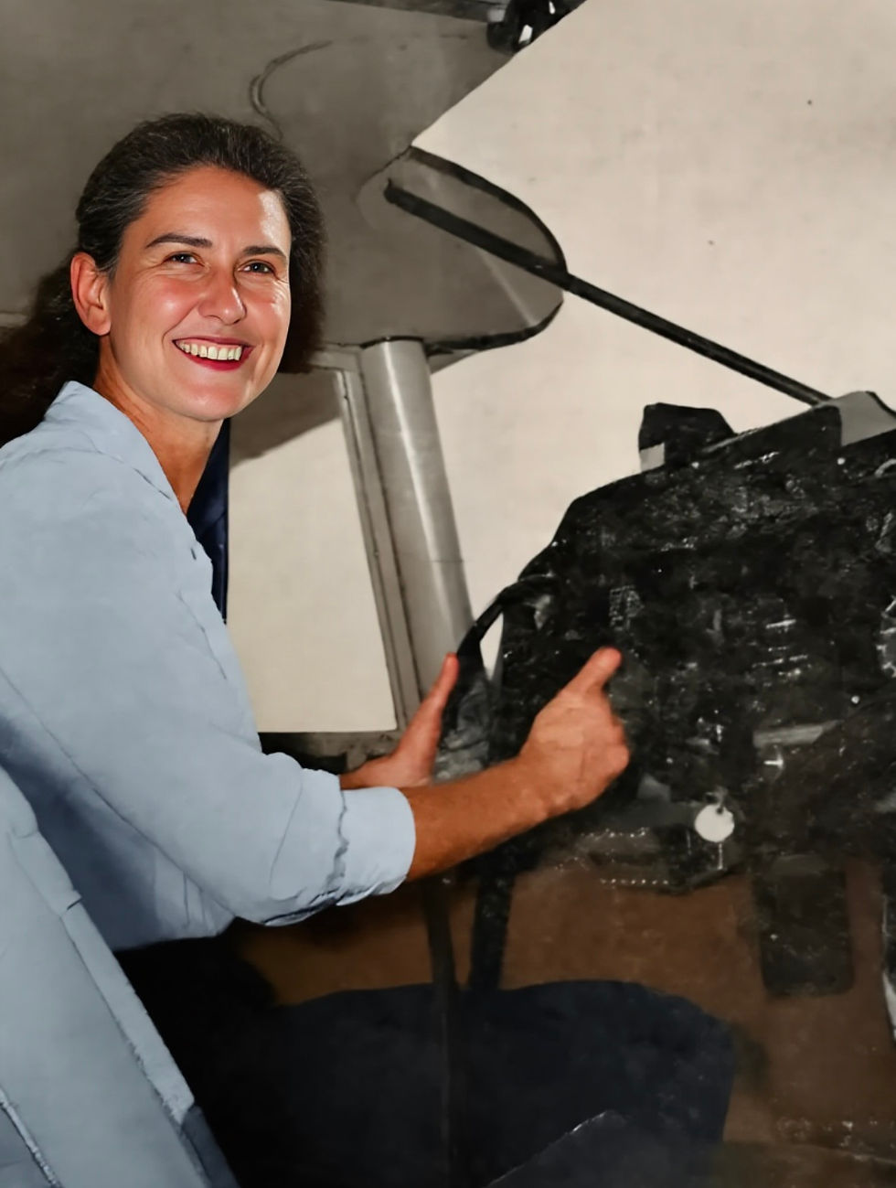 Margaret Radka in the cockpit of her Piper Cub airplane, 1960