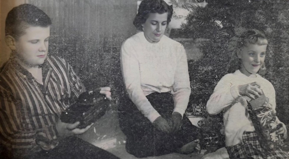 Mrs. Marjorie Schuler is pictured with her 11-year-old son, Randy, and her 6-year-old daughter, Jane, 1958