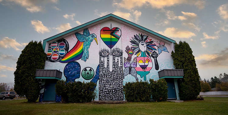 Pride mural on the side of the church building.
