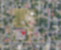 Aerial view of schools, park, and neighborhood homes