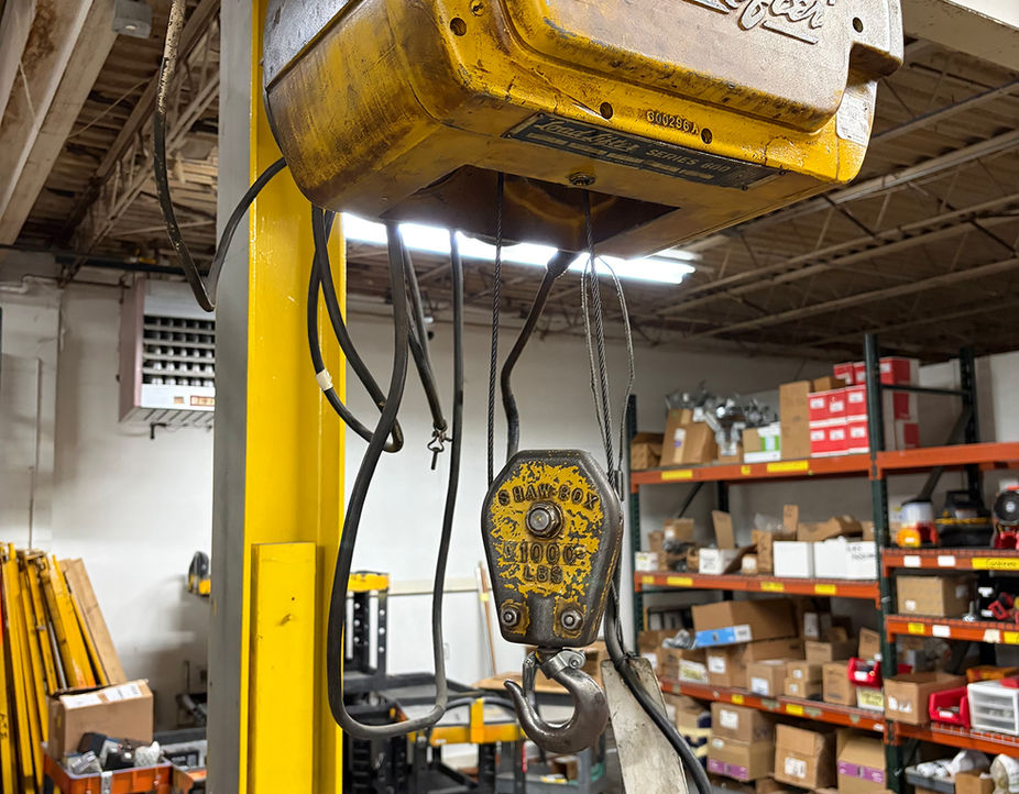 Yellow Load Lifter industrial hoist.