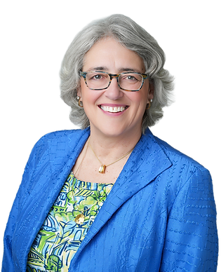 Smiling Diane with gray hair, glasses, and blue jacket.