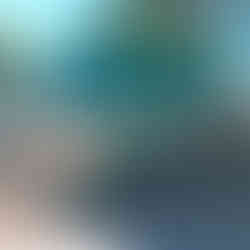 A truck with green domes for glass collection