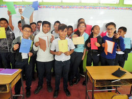 Proud classroom showing their art.