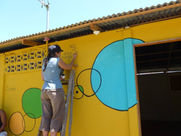 Jennie completes drawchange mural.