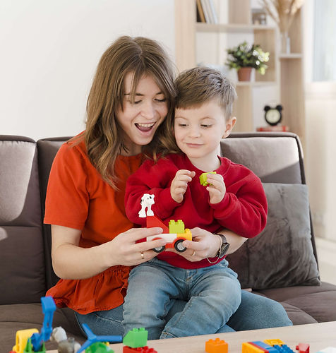smiley-mother-playing-with-her-son-min (1).jpg