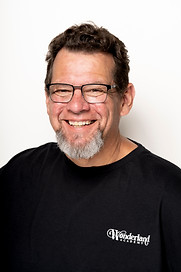 Headshot of Wonderland Instructor, Kirby Jambon.