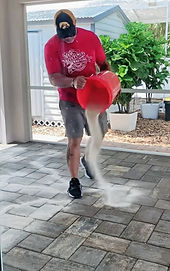 Sanding pavers in order to seal.