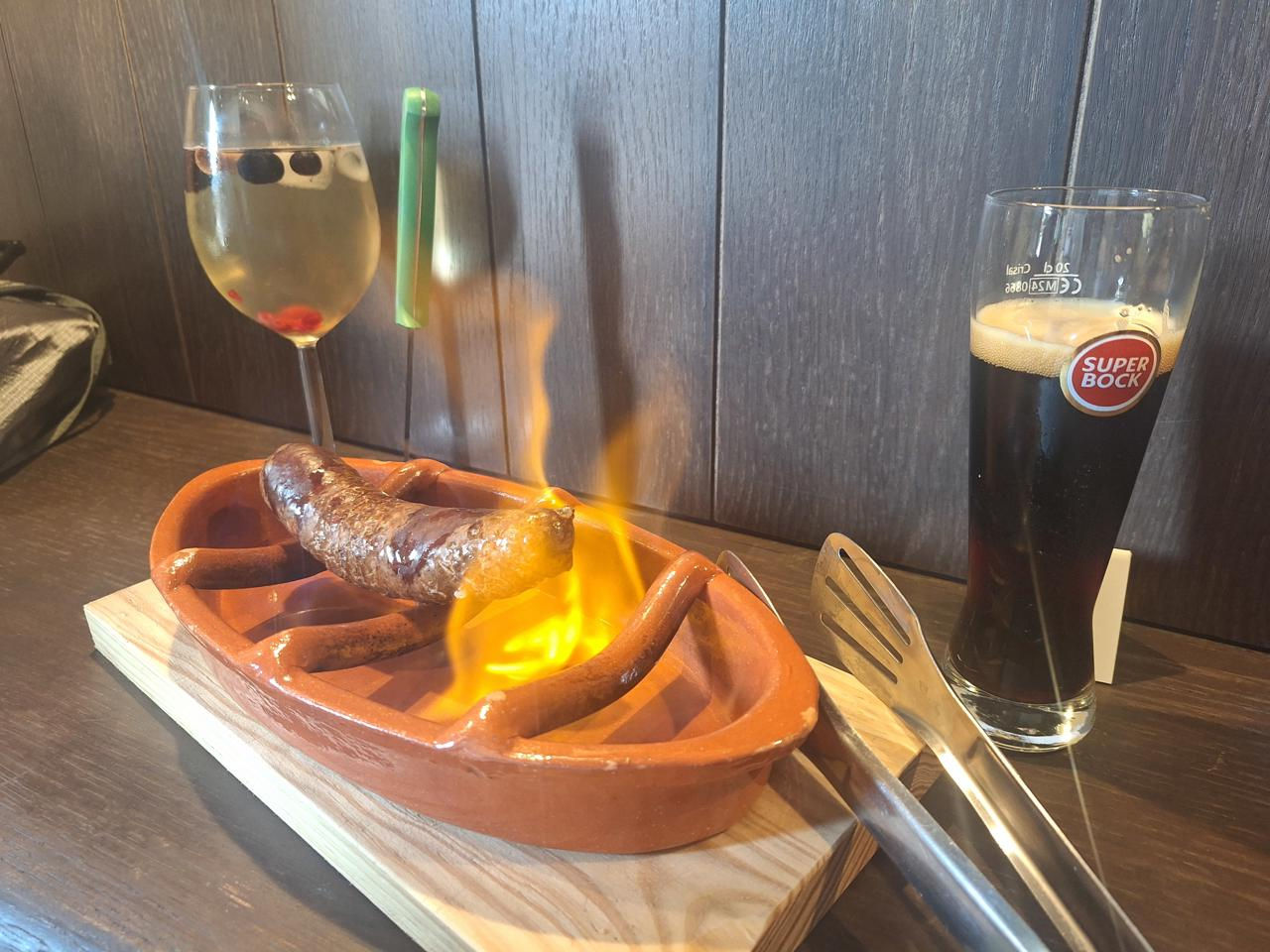 Flaming chorizo at a tasca