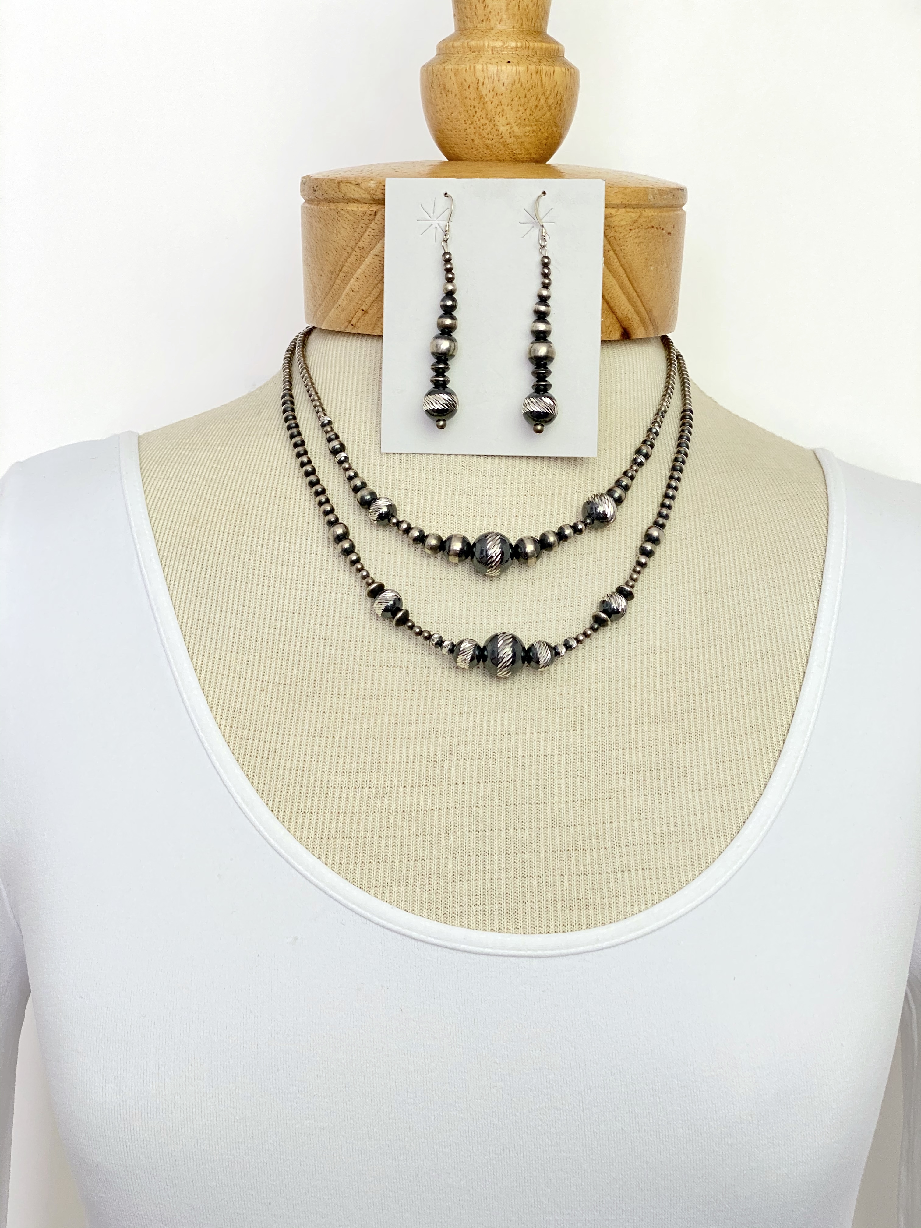 Diamond cut silver bead necklace