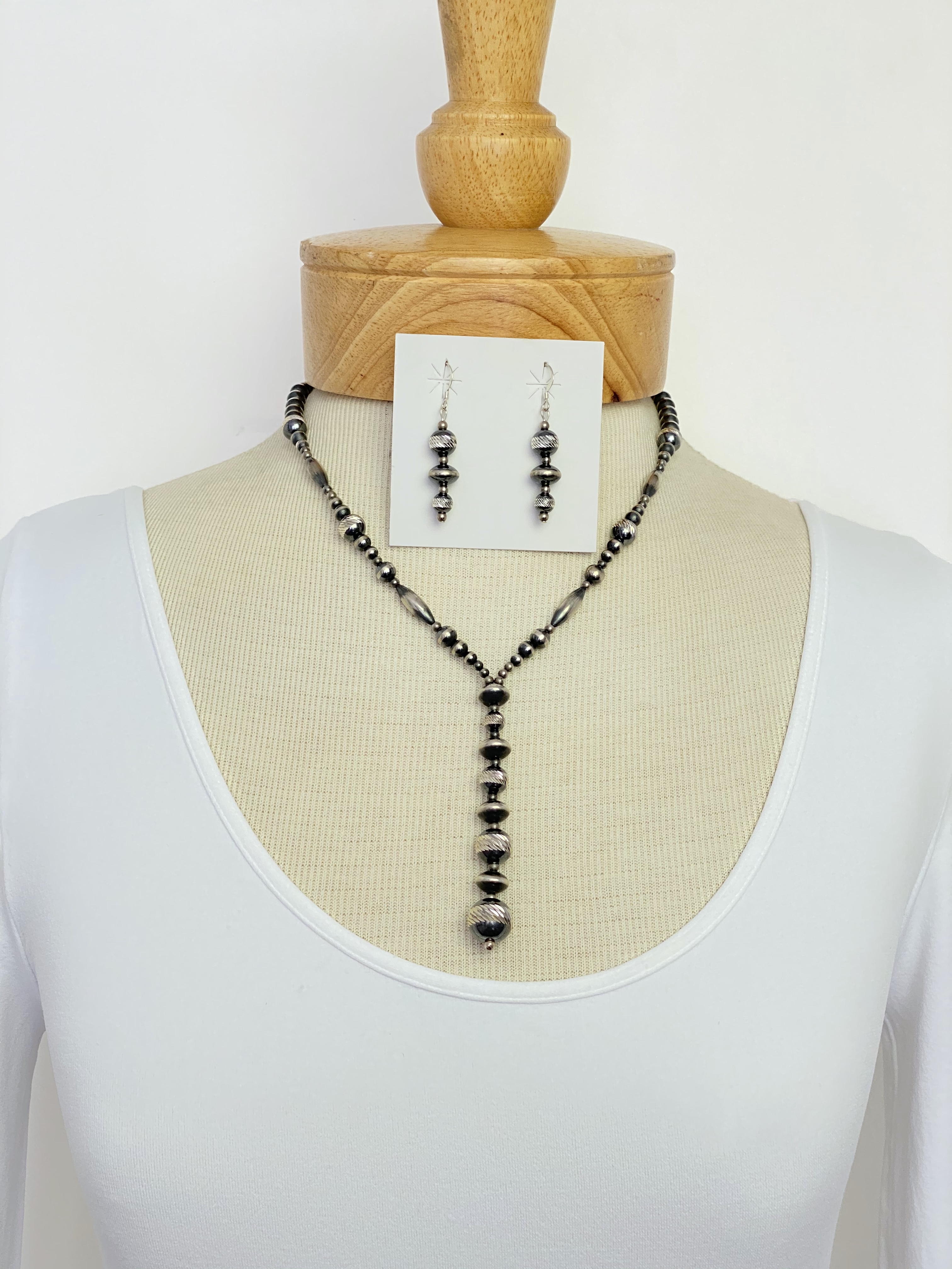 Diamond cut silver bead necklace
