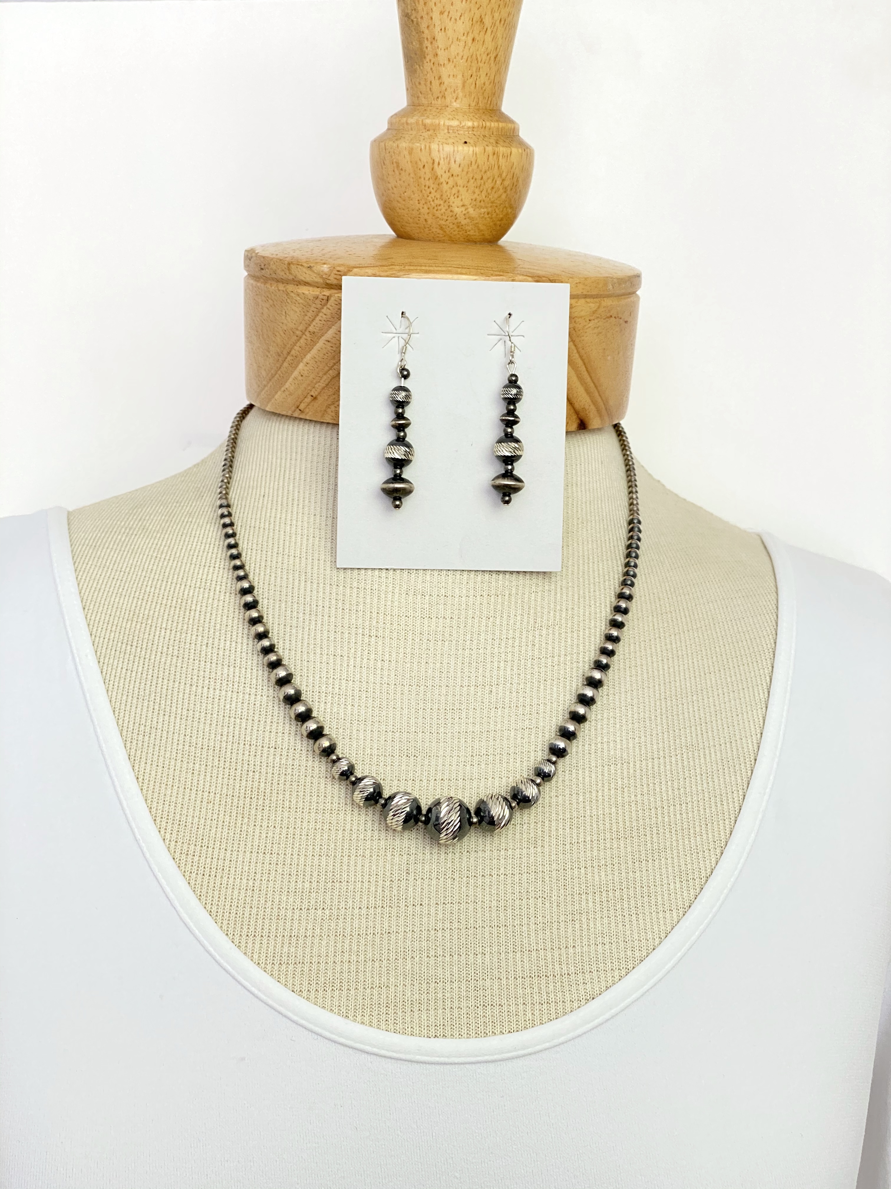 Diamond cut silver bead necklace