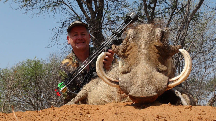 Bagging my first Namibian trophy—a thrilling bow-hunted warthog—made an unforgettable adventure.