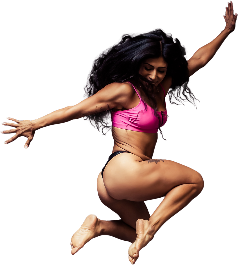 A strong athletic woman jumping in the air