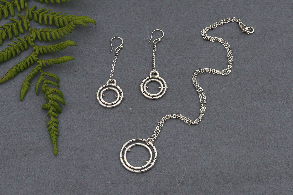 Thumbnail: Kinetic Eye // Gyroscopic Hoop Necklace