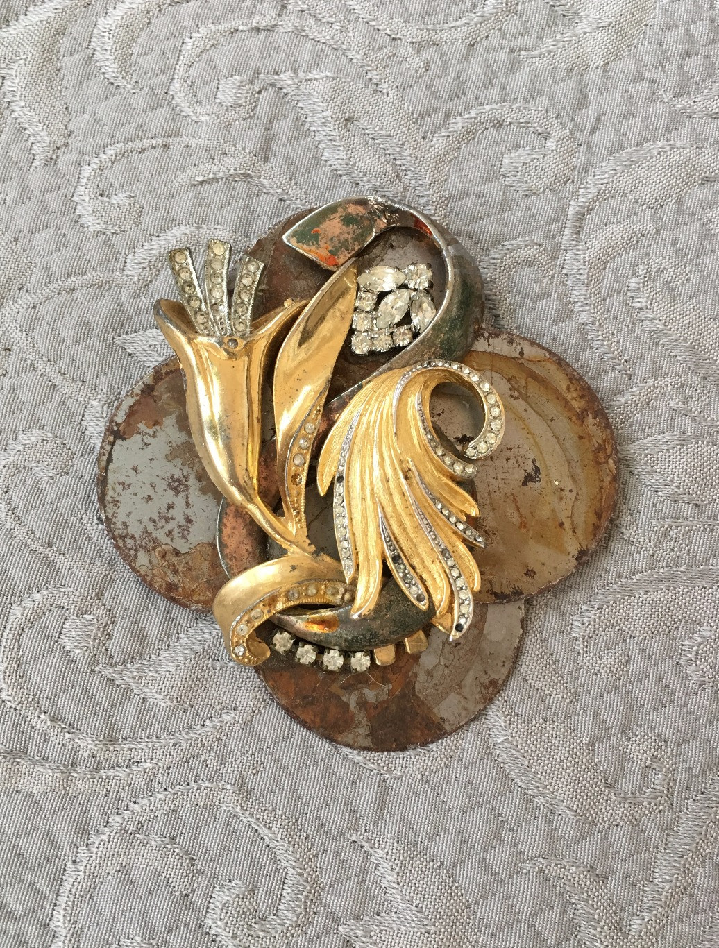Two Gold Tone Vintage Pins on Rusted Disks