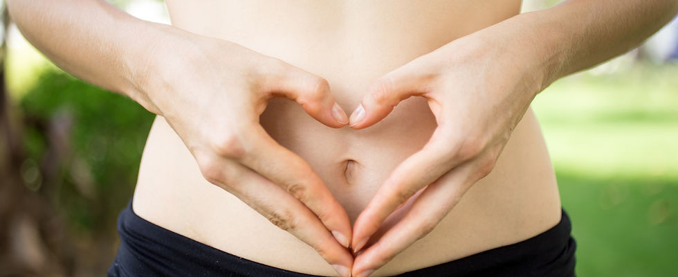 person holding their abdomen