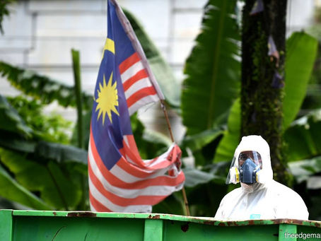 UPDATE 1-Malaysia reports new daily high of over 6,000 COVID-19 cases