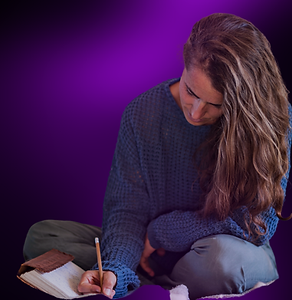 Woman journaling during new-year-intention-ritual-breathwork-oracle-houston.png