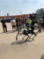 Laredo Police Department SWAT Team members showcase the robodog named RAPTOR (Robotic Assault Risk Prevention and Tactical Operations Responder) at a career day at a local school.