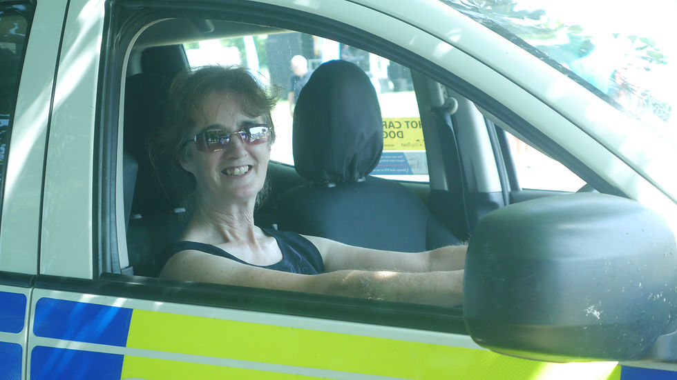 I sat in a police car