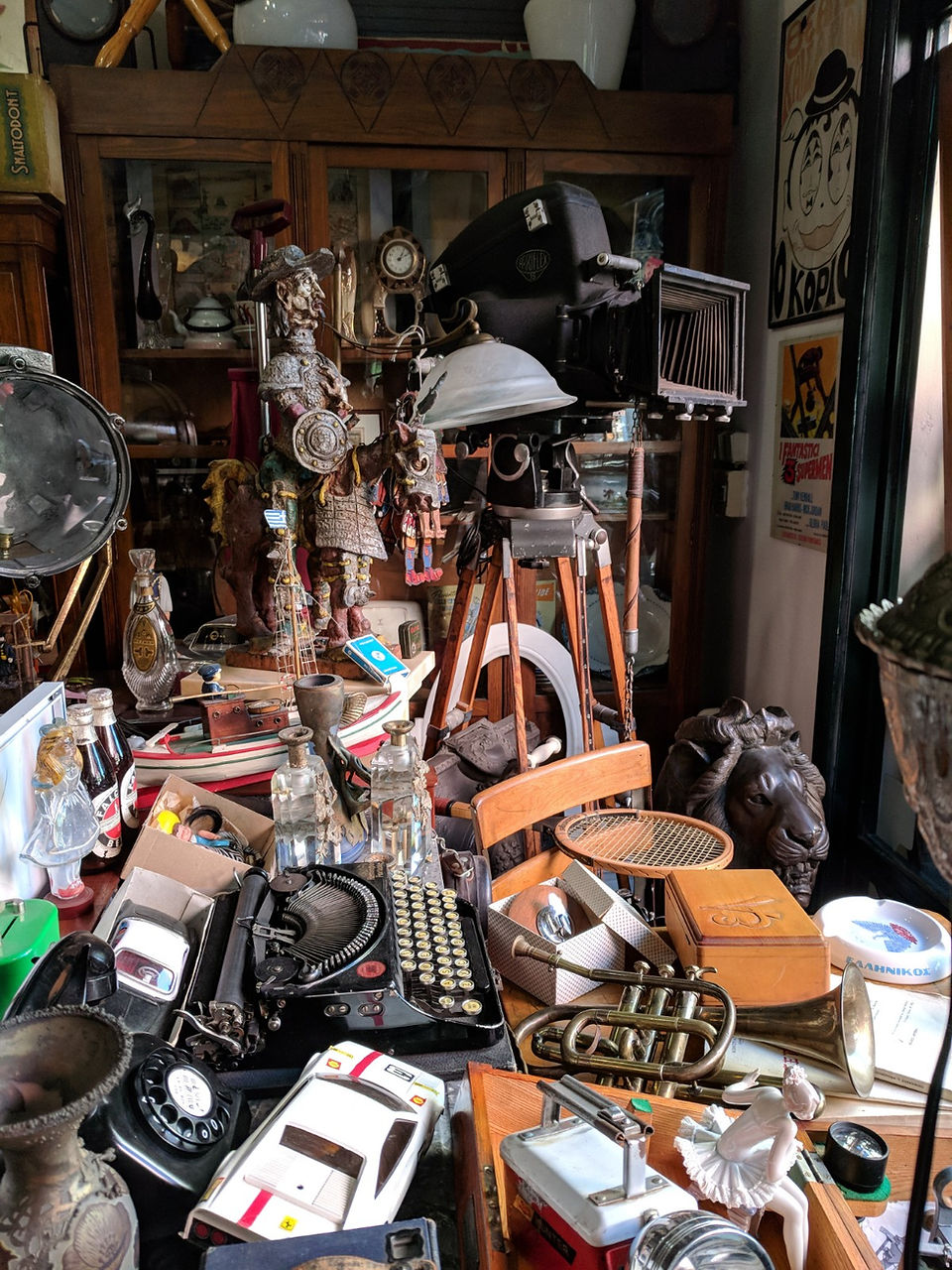 Antique type writer, telephone, and artifacts. 