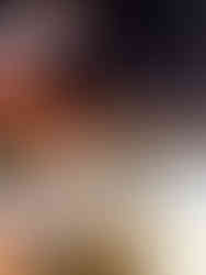 food stalls line the start of Trocadero Gardens. Colorful fair flags and lights adorn the sitting area.