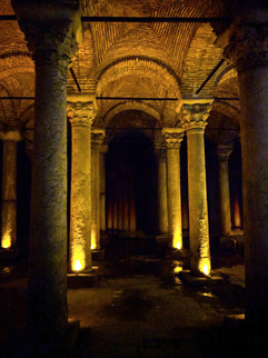 Dim lit underground basilica cisterns in Istanbul Turkey