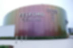 Entryway to the Telford International Centre, a modern complex featuring a large glass and steel atrium entrance.