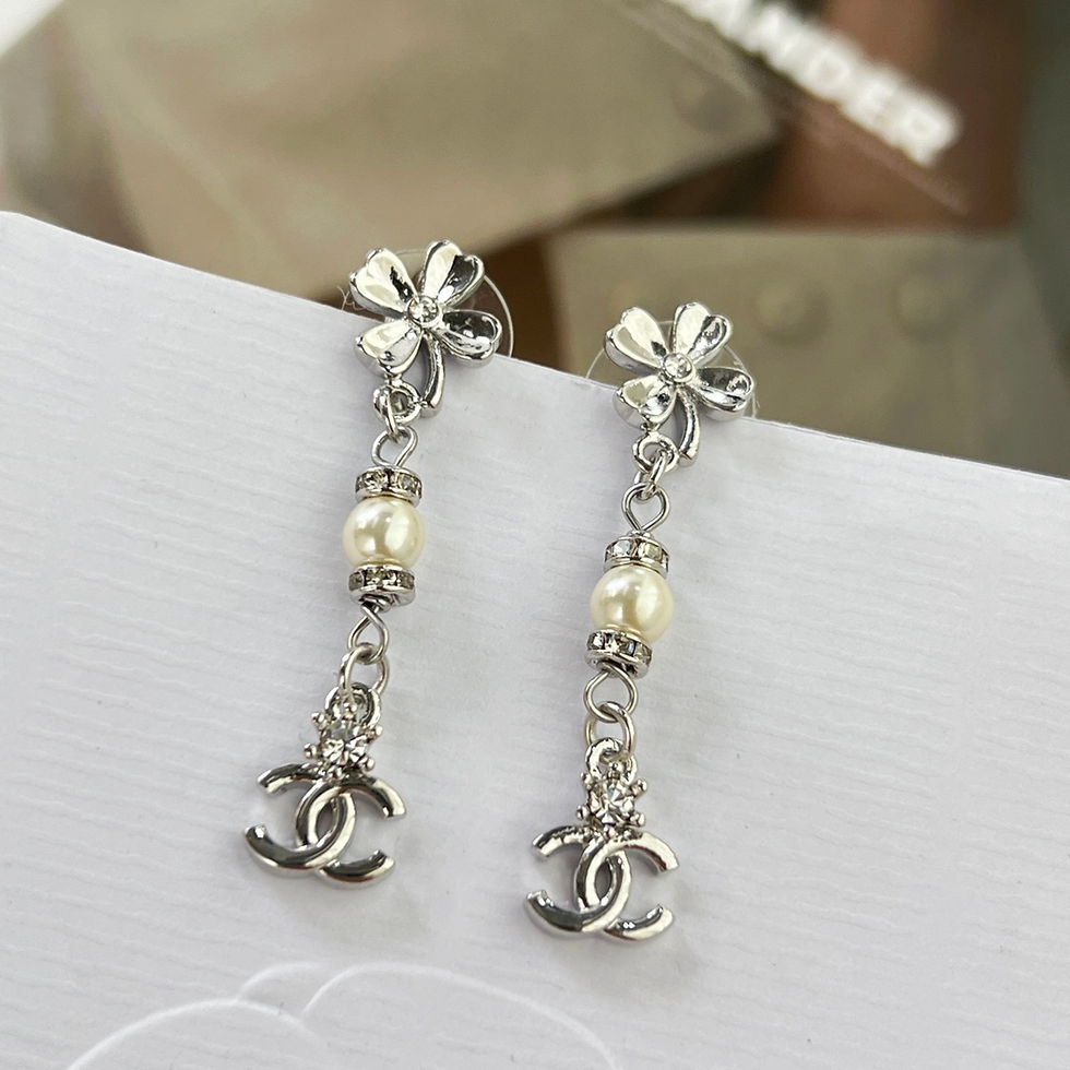 Thumbnail: Chanel double c stud earrings | Fashion Haven