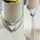 Thumbnail: PRADA Triangle Keychain Necklace