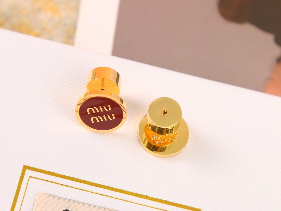 Thumbnail: MIU MIU button stud earrings