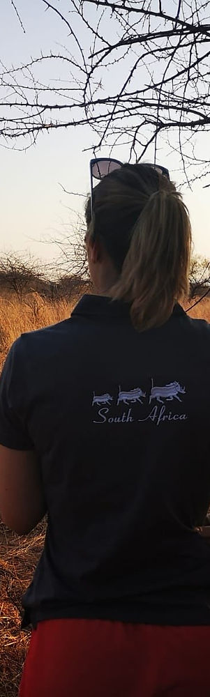 Female Conservationist Viewing Rhino