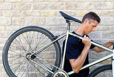 Matt holding bike.jpg